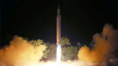 AFP PHOTO/KCNA VIA KNS A North Korean missile blasts off