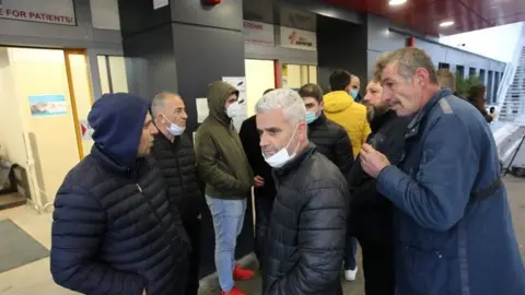 Reuters Relatives of passengers injured in the crash gather outside the hospital in Sofia