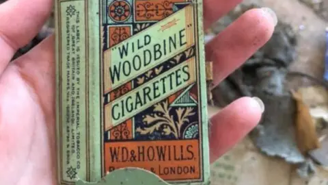 Scarborough Archaeological and Historical Society A cigarette packet was among the objects found