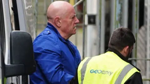 PA Media Neil Foden arriving at Mold Crown Court