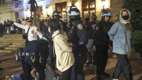 Getty Images NYPD arrest students outside of a Columbia University building