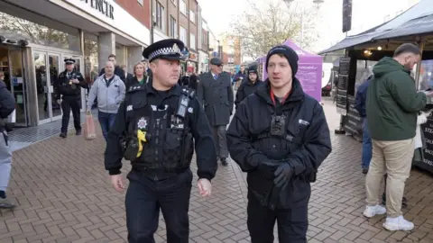 Ben Schofield/BBC Police patrolling Moulsham Street in Chelmsford as part of anti-social hotspot crackdown