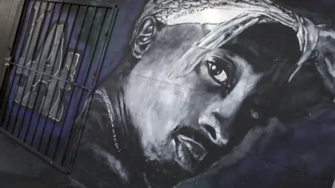 Getty Images A wall dedicated to the memory of US rapper Tupac Shakur in Los Angeles