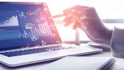 Getty Images A businessman at a computer