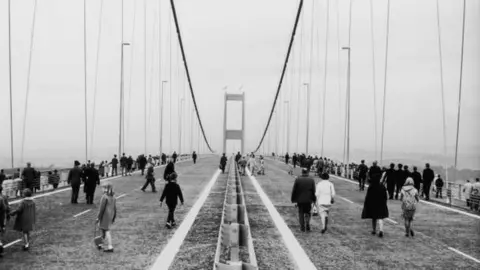 Getty Images People walking along the Severn Bridge