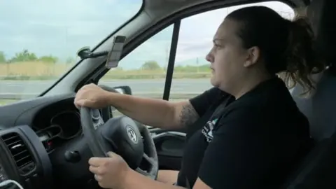 BBC Abby Austen driving her van