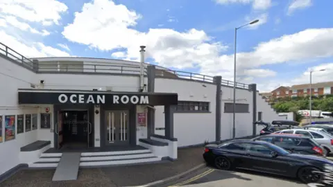 Google Maps Image of a white building with Ocean Room written on the top of the entrance