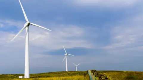 Getty Images Wind turbines