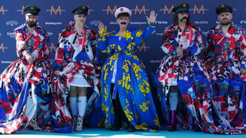 PA Media Croatia's Let 3 on the Eurovision turquoise carpet in Liverpool