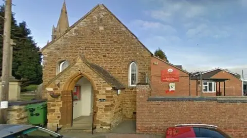 Google Old stone village school building with porch