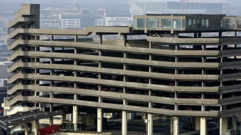 PA Media A large concrete multi-storey car park