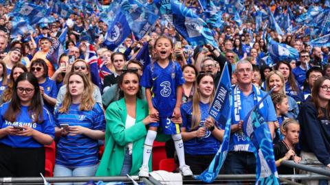  A young Chelsea fan cheers on the team during the Vitality Women's FA Cup Final between Chelsea and Manchester United at Wembley Stadium on May 14, 2023 in London
