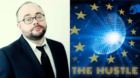 PA Media Rhodri Marsden with The Hustle artwork