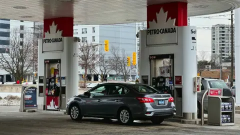 NurPhoto/Getty cars at a Petro-Canada gasoline station in Toronto