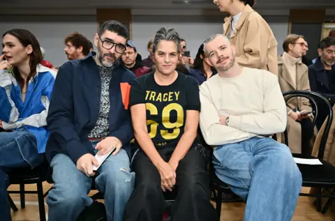 Dave Benett/Getty Images Robert Diament, Tracey Emin and Russell Tovey attend the JW Anderson AW24 show during London Fashion Week February 2024 at the Seymour Leisure Centre on February 18, 2024 in London, England.