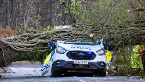 Crushed police van