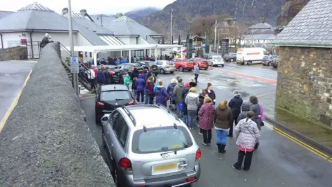 Vivian Williams People queuing for bottled water in Blaenau Ffestiniog