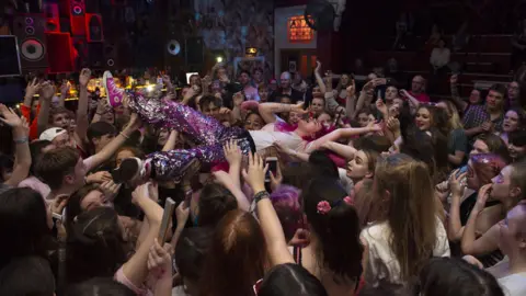 Getty Images Girli at the Deaf Institute in 2018