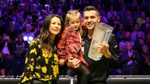 Getty Images Mark and his family