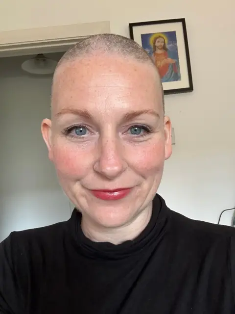 Claire O'Shea Claire O'Shea after shaving her head