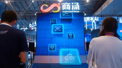 Future Publishing People stop by SenseTime booth at Shanghai trade expo in 2021. The artificial intelligence firm plans to launch IPO in Hong Kong.