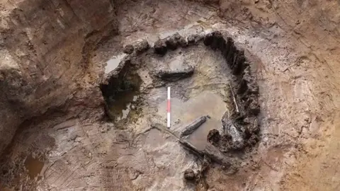 Cotswold Archaeology Pit where axle found