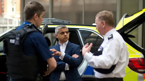 Getty Images Sadiq Khan and police