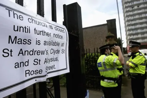 Getty Images Sign outside St Patrick's Church after Angelika's body was discovered