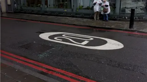 Getty Images 20mph sign painted on a London road