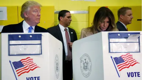 Reuters Mr and Mrs Trump vote