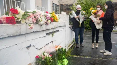 Getty Images A memorial for the victims outside Young's Asian Spa