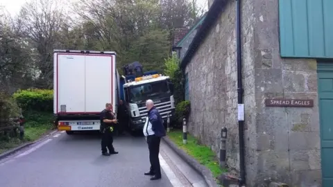 Save Dinah's Hollow Two lorries stuck on the road through Melbury Abbas