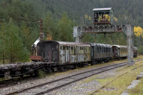 Alamy Three disused train carriages near Canfranc