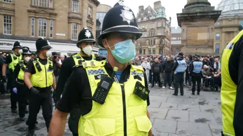 Owen Humphreys/PA Police at a Black Lives Matter protest at Grey's Monument, Newcastle