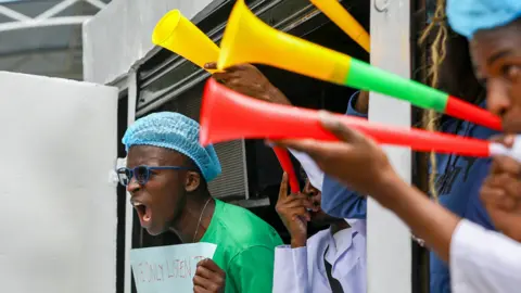 Daniel Irungu/EPA Protesting medics with vuvuzelas in Nairobi, Kenya - Tuesday 9 April 2024