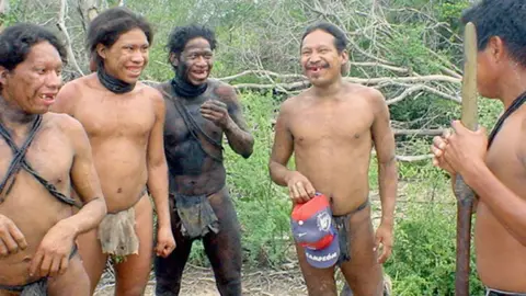 Getty Images Ayoreo Totobiegosode tribe embers in traditional wear