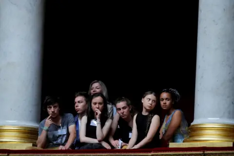 Philippe Wojazer / Reuters Swedish environmental activist Greta Thunberg, Ivy-Fleur Boileau, Virgile Mouquet, Adelaide Charlier and Alicia Arquetoux - French activists from the Youth for Climate movement - attend the questions to the government session at the National Assembly in Paris, France, 23 July 2019.