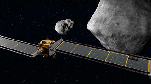 Dimorphos: Nasa flies spacecraft into asteroid in direct hit - BBC News
