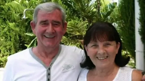Family handout David and Janice Hunter with their arms around each other