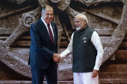 Reuters Indian Prime Minister Narendra Modi welcomes Russian Foreign Minister Sergei Lavrov upon his arrival for the G20 Summit in New Delhi, India September 9, 2023.