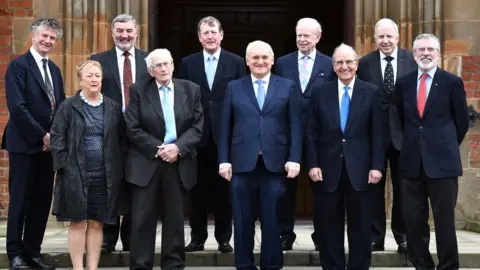 Charles McQuillan/Getty Images Politicians including Gerry Adams and David Trimble gather at Queen's University