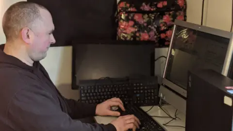 BBC Eoghan Barr working to refurbish donated computers