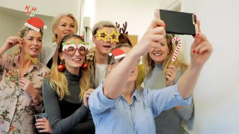 People celebrating at a Christmas party