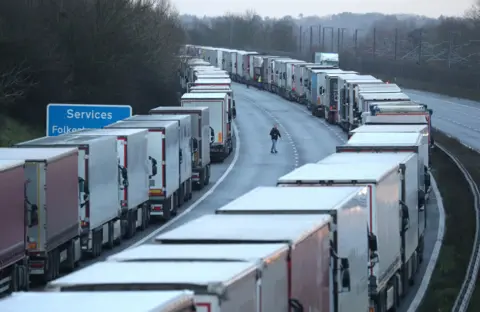 Andrew Matthews/PA  Lorries queuing on Kent motorway