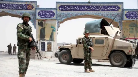 EPA Afghan government soldiers in the western city of Herat, Afghanistan. Photo: July 2021