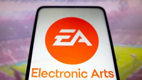 Getty Images EA logo against background of a football pitch