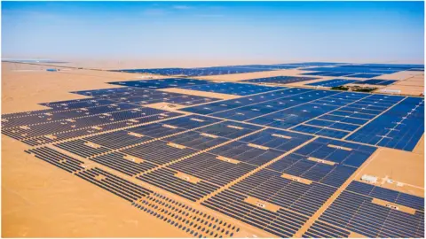 Getty Images Large photovoltaic panels are placed neatly. Dunhuang City, Gansu Province, China