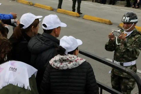 Reuters Faithful wait for the arrival of Pope Francis in Bogotá, Colombia, September 6, 2017