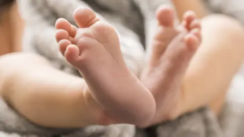 Getty Images Baby feet