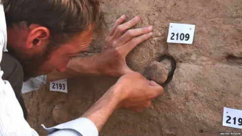 British Museum Excavating cones from the walls of the temple at Tello